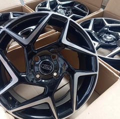 ST FIESTA STYLE   RIMS  4/108 GLOSS BLK MACHINE FACE
